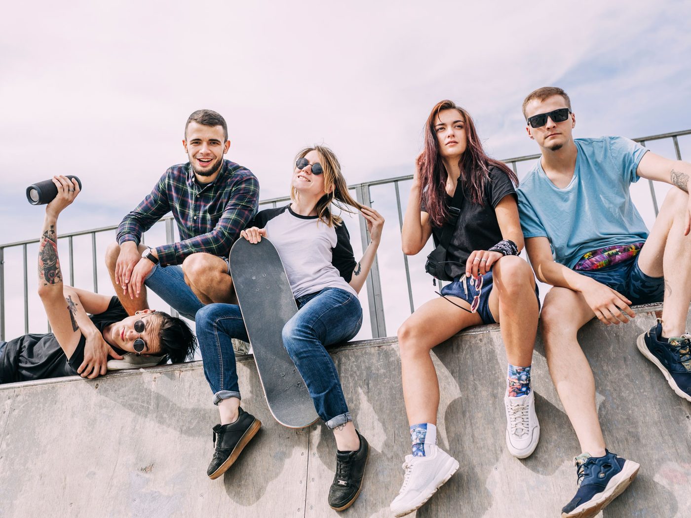 Group of friends relaxing outdoors on a sunny day